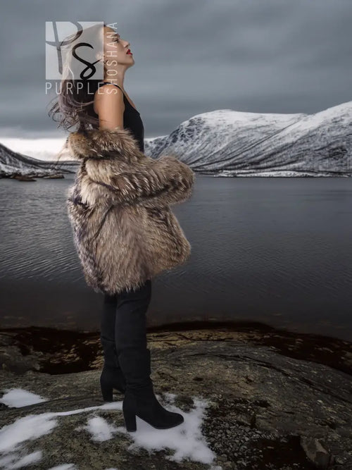 Brown raccoon fur jacket with oversized collar, cropped view from the side