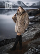 Raccoon fur jacket with voluminous collar, taupe-brown shaggy fur, standing pose