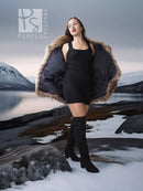 Brown raccoon fur jacket with voluminous collar and open front over a black dress