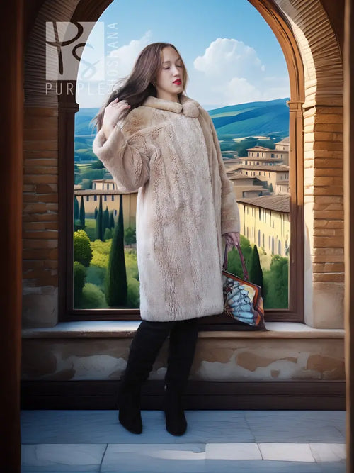 Sheared beaver coat in light honey with plush collar, standing full-body view