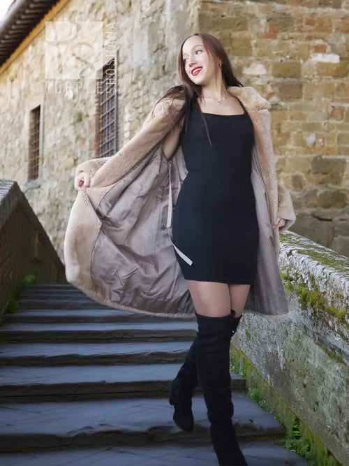 Sheared beaver coat in light honey, open front look, plush texture, long hem
