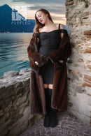 Brown mink coat with wide fur collar and open front, long sleeves and dark hem