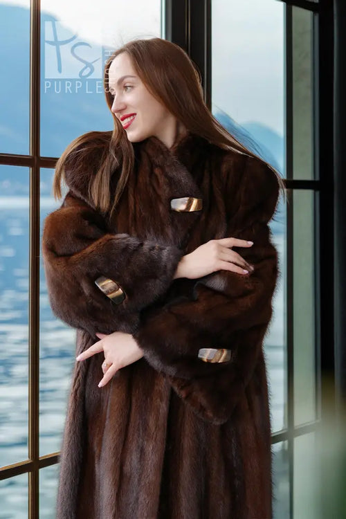 Brown mink coat close-up with plush fur, wide collar, and rectangular cuff details