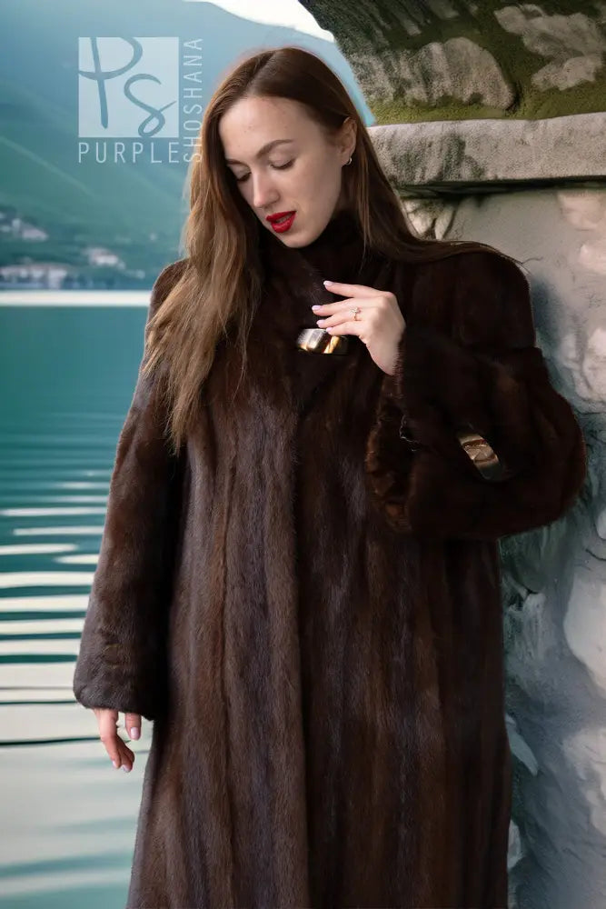 Dark brown mink coat with stand collar and front button detail