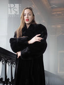 Black fur coat with long sleeves and standing collar, front view