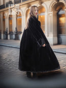 Black beaver fur long coat with V-neck, button front, and wide draped hem