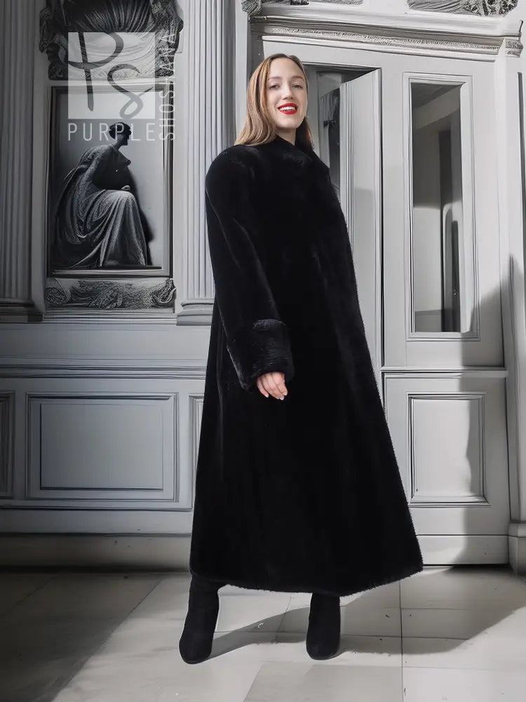 Long black fur coat with high neckline and straight skirt hem