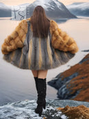 Back view of two-tone fur coat with golden fox fur shoulders and gray fur length