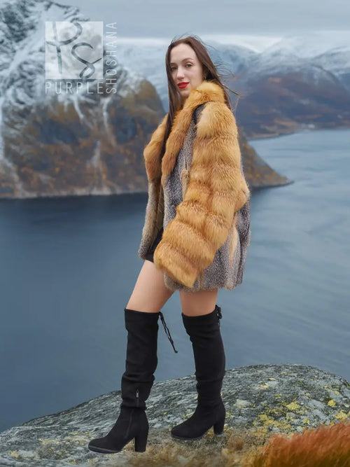 Front view of two-tone fur coat with golden fox fur shoulders and gray fur, standing outdoors