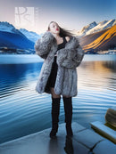 Platinum fox fur coat in gray, textured puffed sleeves and straight hem.