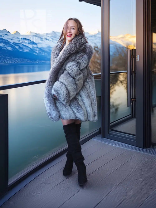 Gray fur coat with wide collar, long sleeves, midi length, full-length side view