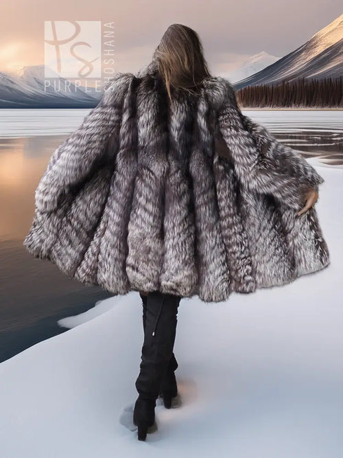 Silver and gray fur hooded coat with flared sleeves and full-length silhouette