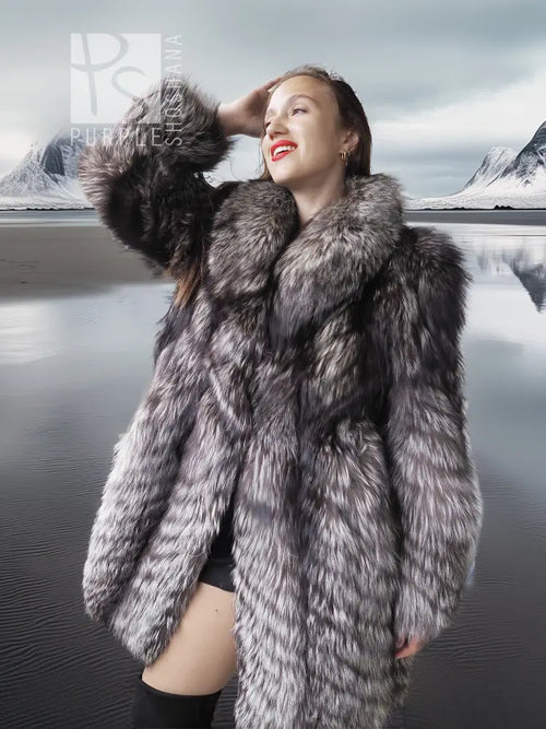 Silver fox faux fur hooded coat with plush texture, model wearing it with black clothing.