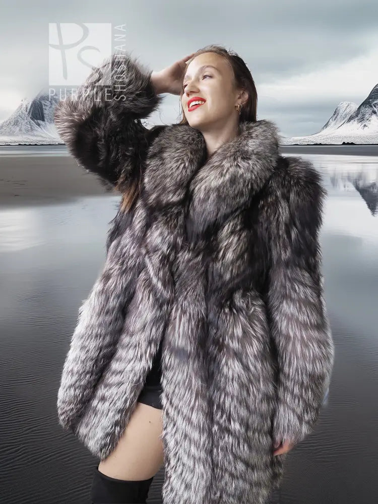 Silver fox faux fur hooded coat with plush texture, model wearing it with black clothing.