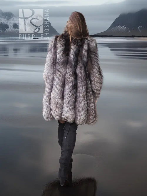 Gray and silver fur hooded coat, back view with cape-like flare sleeves