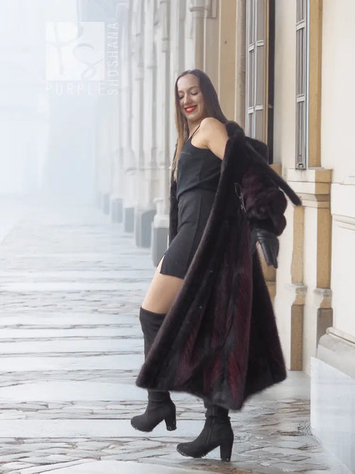 Hooded mink fur coat, black and burgundy tones, long A-line silhouette