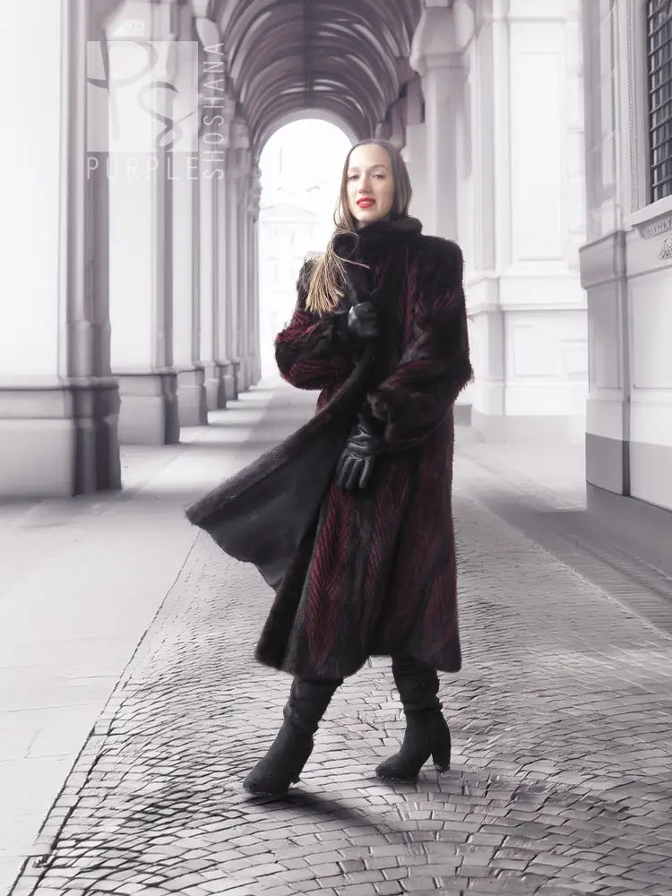 Two-tone mink fur coat with dark red trim, high collar, long sleeves