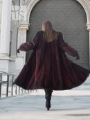 Back view hooded mink fur coat, black and burgundy tones, flared hem