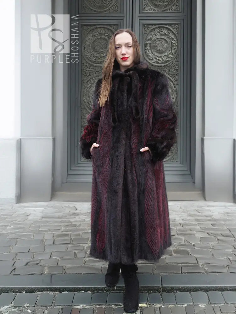 Two-tone mink fur coat with hood, black and burgundy panels, long sleeves