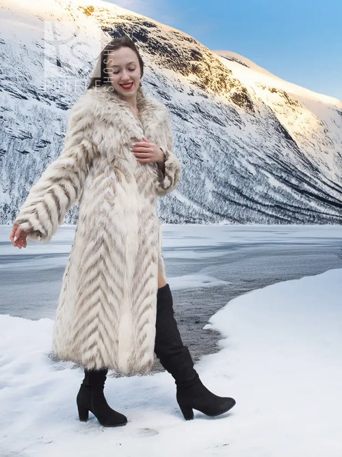 Cream two-tone fox-fur coat with chevron stripes and open shawl collar