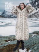Cream two-tone faux fur coat with shawl collar, chevron pattern, full-length on model