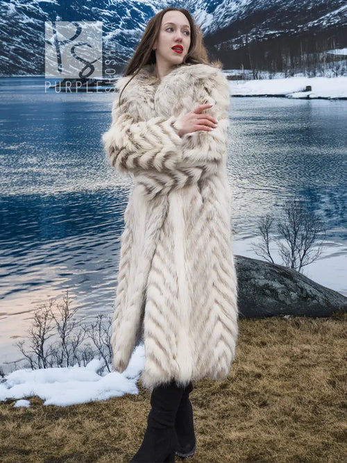 Cream two-tone faux fur coat with shawl collar, chevron pattern, long sleeves