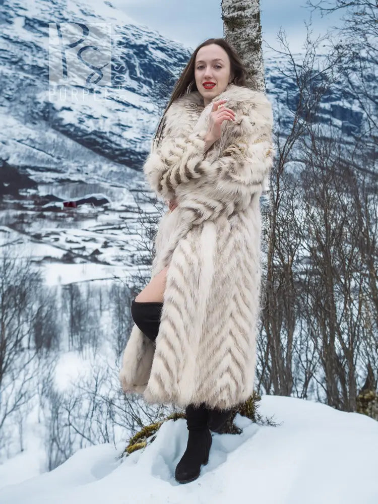 Cream two-tone faux fur coat with shawl collar, chevron pattern, profile view