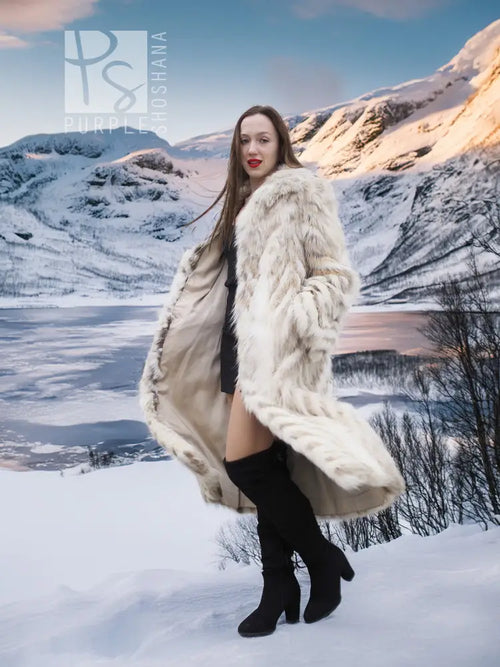 Cream two-tone faux fur coat with shawl collar and chevron pattern, side profile