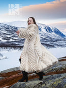 Cream two-tone fox-fur coat with chevron pattern and flowing shawl collar