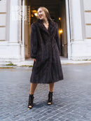 Two-tone muskrat fur coat, dark fur with soft sheen, relaxed fit, mid-length