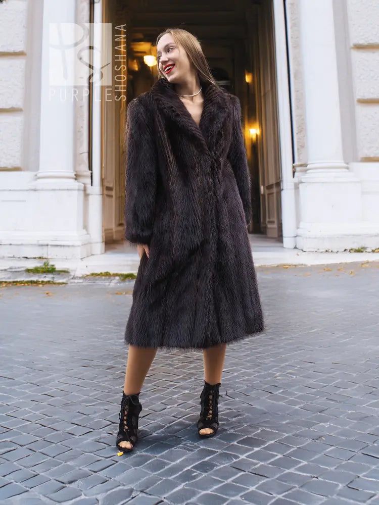Two-tone muskrat fur coat, dark fur with soft sheen, relaxed fit, mid-length