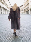 Two-tone muskrat fur coat back view, long herringbone texture and hemline
