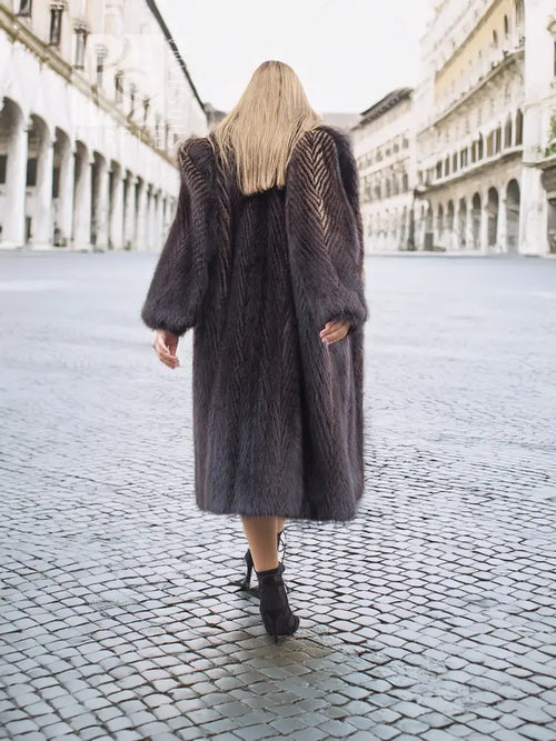 Two-tone muskrat fur coat back view, long herringbone texture and hemline