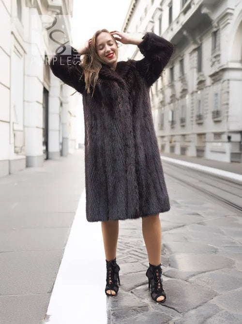 Two-tone muskrat fur coat, dark herringbone pattern, wide sleeves and notched front