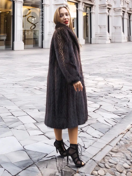Muskrat fur coat with two-tone herringbone texture, full-length silhouette