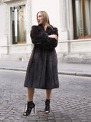 Two-tone muskrat fur coat, dark herringbone fur with light collar detail, mid-length