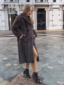 Two-tone muskrat fur coat, open side view, plush herringbone texture