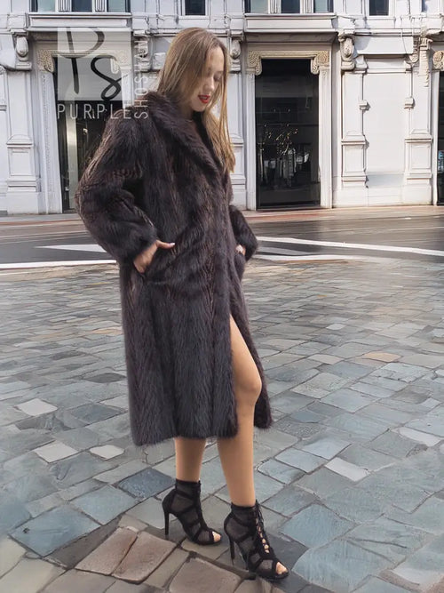 Two-tone muskrat fur coat, open side view, plush herringbone texture
