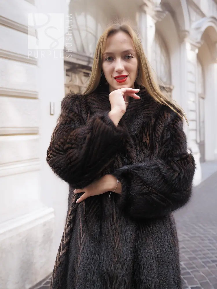 Two-tone muskrat fur coat close-up, high collar and two-tone herringbone fur