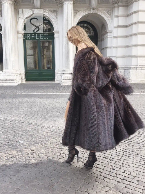 Two-tone muskrat fur coat, herringbone design, high neck, full skirt, side view