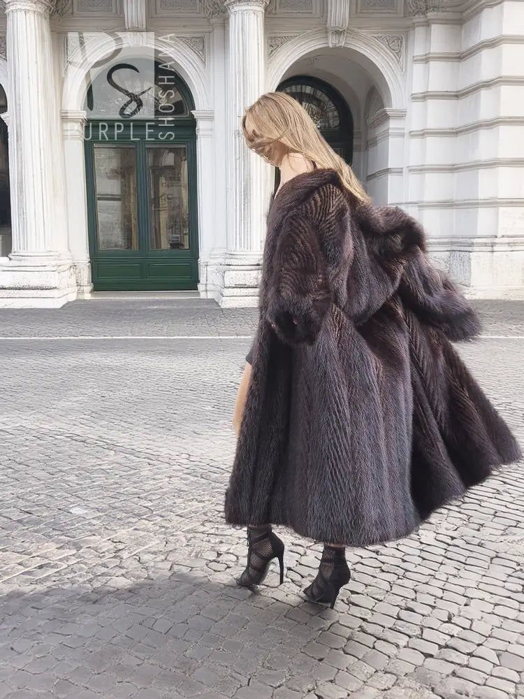 Two-tone muskrat fur coat, herringbone design, high neck, full skirt, side view