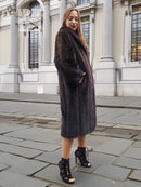 Two-tone muskrat fur coat, textured herringbone weave and side profile