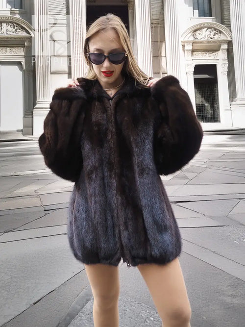 Unisex mink fur bomber jacket, dark plush fur, zip-front with stand collar.