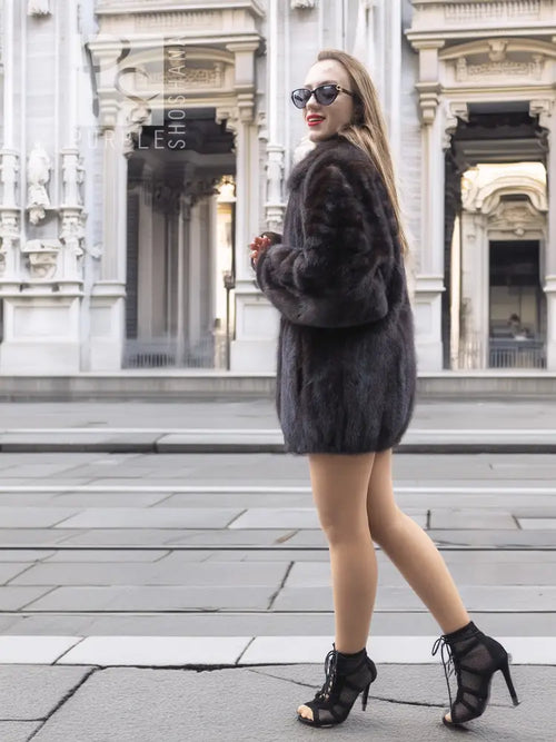 Unisex mink fur bomber jacket, dark fur with stand collar and zip-front; short fitted hem.