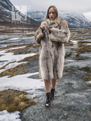 Unisex plush fur coat, shawl collar, light taupe/gray, front view with arms crossed