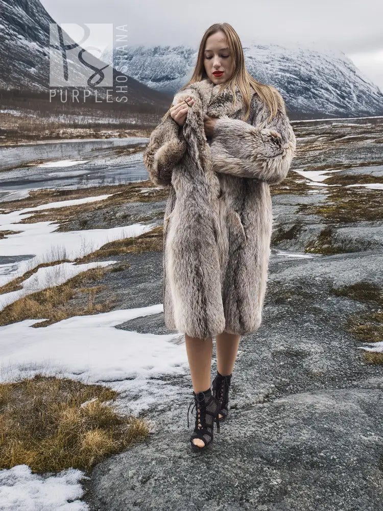 Unisex plush fur coat, shawl collar, light taupe/gray, front view with arms crossed