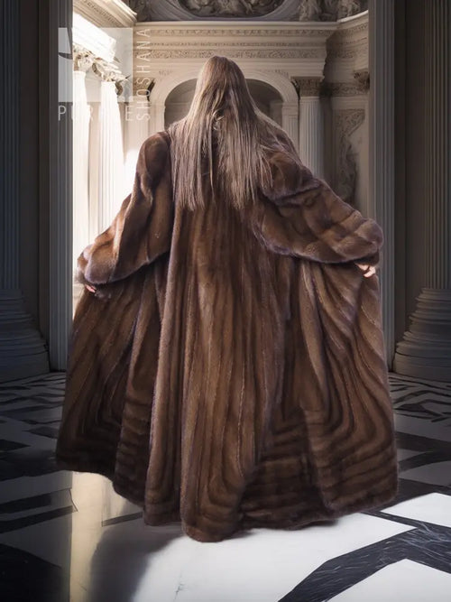 Back view of mahogany brown mink fur coat with long sleeves and flared hem.