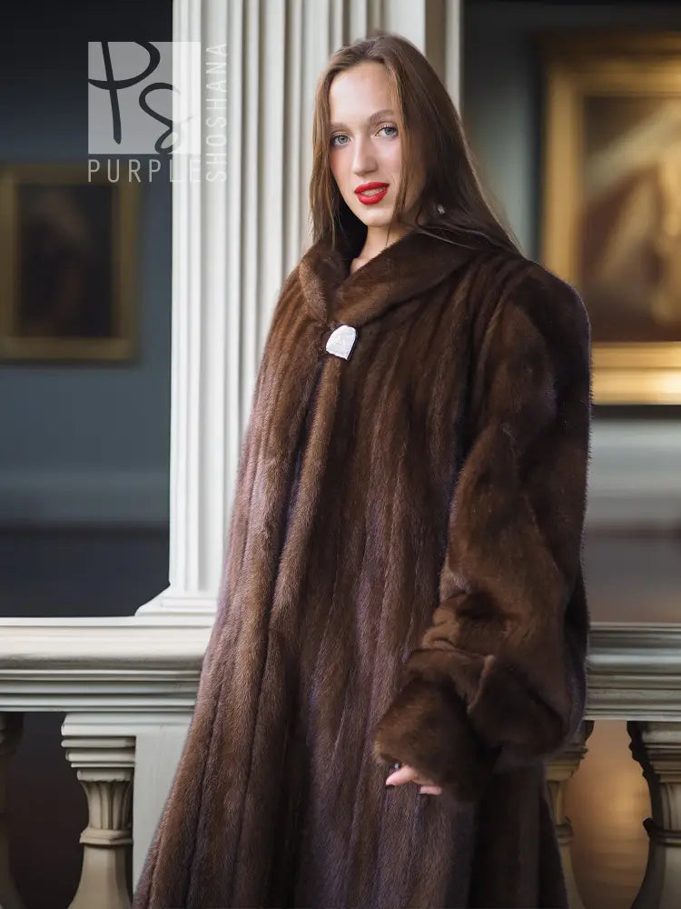 Dark brown mink fur coat with button front and structured pockets