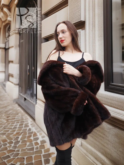 Mink fur opera coat with shawl collar and full sleeves, dark brown textured fur