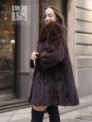Dark brown mink fur coat with wide collar and textured sleeves, three-quarter view